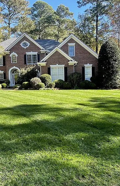Wake Forest NC home with well-maintained lawn and landscaping