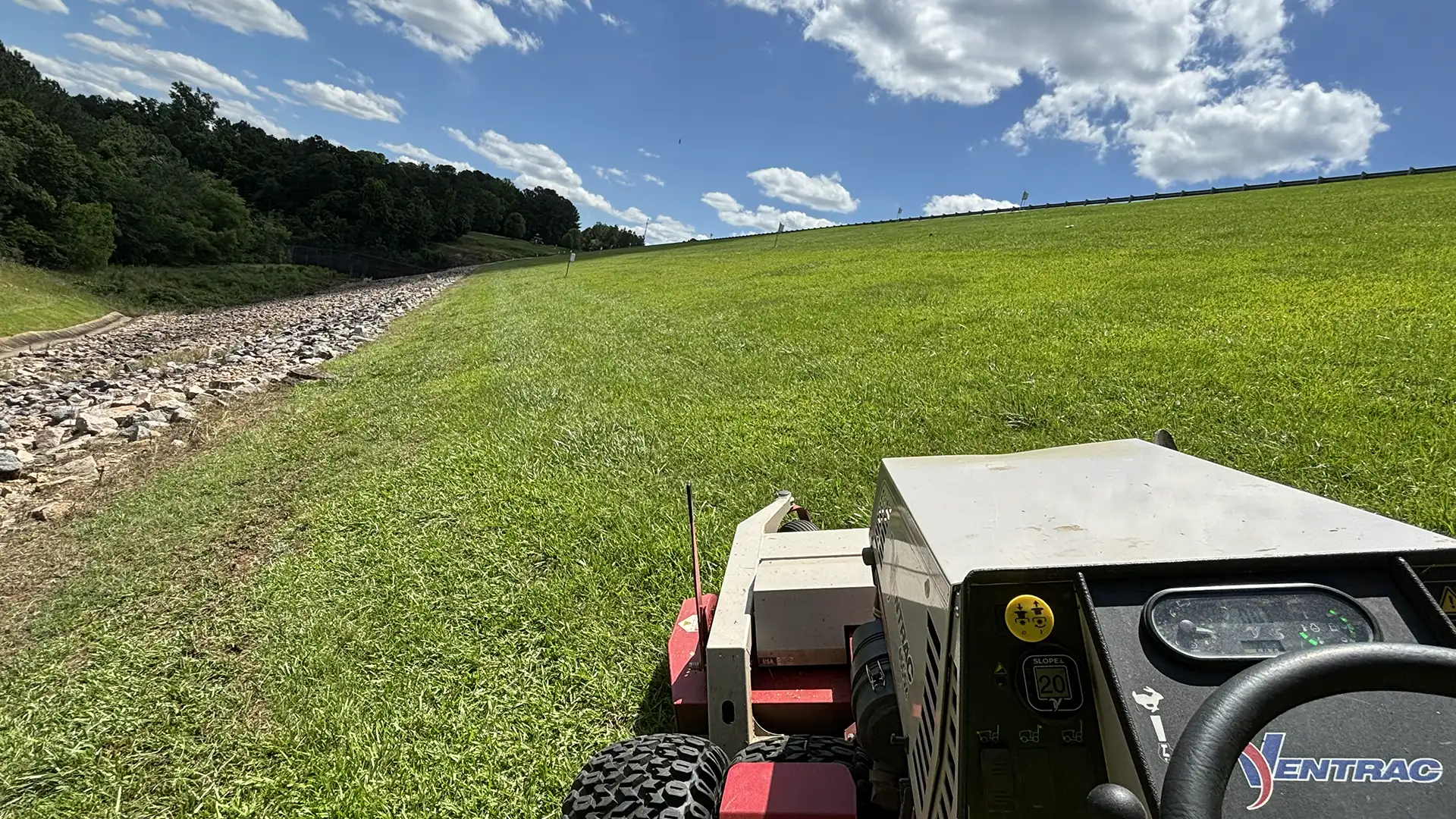 terrain landscaping on sloped yard in Wake Forest NC